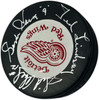 Gordie Howe, Sid Abel, & Ted Lindsay Autographed Official Detroit Red Wings Logo Hockey Puck Production Line Beckett BAS #AE85128