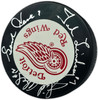 Gordie Howe, Sid Abel, & Ted Lindsay Autographed Official Detroit Red Wings Logo Hockey Puck Production Line Beckett BAS #AE85134