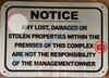 NOTICE ANY LOST DAMAGED OR STOLEN PROPERTIES WITHIN THE PREMISES OF THIS COMPLEX ARE NOT THE RESPONSIBILITY OF THE MANAGEMENT OR OWNER SIGN- BRUSHED ALUMINUM