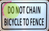 DO NOT CHAIN BICYCLE TO FENCE SIGN-