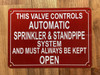 THIS VALVE CONTROLS AUTOMATIC SPRINKLER AND STANDPIPE SYSTEM AND MUST ALWAYS BE KEPT OPEN COMPLIANCE SIGN