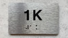 HPD APT NUMBER 1K SIGN-UNIT NUMBER SIGN WITH RAISED LETTERS