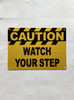 5x7-caution-watch-your-step-orange-metal-identification-sign.jpg