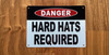 white-danger-hard-hats-requi-screw-mount-sign.jpg