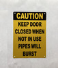 yellow-caution-keep-door-closed-when-not-in-use-pipes-will-burst-screw-mount-sign.jpg