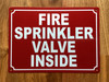 fire-sprinkler-valve-inside-aluminum-identification-sign.jpg