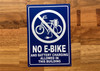 no-e-bike-and-battery-charging-allowed-in-this-building-7x10-blue-blue-safety-sign.jpg