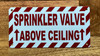 sprinkler-valve-above-ceiling-3x6-building-signage.jpg