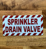 sprinkler-drain-valve-white-safety-sign.jpg