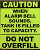 CAUTION WHEN ALARM BELL SOUNDS, TANK IS FILLED TO CAPACITY Sign