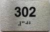 BRAILLE APARTMENT NUMBER 302 SIGN