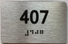 BRAILLE APARTMENT NUMBER 407 SIGN