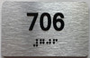 BRAILLE APARTMENT NUMBER 706 SIGN