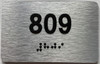 BRAILLE APARTMENT NUMBER 809 SIGN