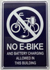 No E-Bike and battery charging allowed in this building SIGNAGE  SIGNAGE