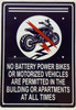 No battery power bikes or motorized vehicles are permitted in the building or apartments at all times  Dob Sign