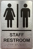 ADA RESTROOM / UNISEX COMPLIANT WITH RAISED SIGN