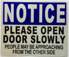 Please open door slowly HPD SIGN