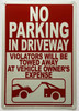 No parking in driveway with image DOB SIGN