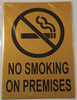 NO SMOKING ON PREMISES SignGOLD BACKGROUND