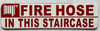 FIRE HOSE IN THIS STAIR CASE HPD SIGN