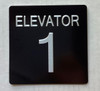 ELEVATOR NUMBER 1 SIGNAGE with Raised letters/Image & Grade 2 Braille - Includes Red Adhesive pad for Easy Installation ELEVATOR NUMBER 1 SIGNAGE with Raised letters/Image & Grade 2 Braille - Includes Red Adhesive pad for Easy Installation