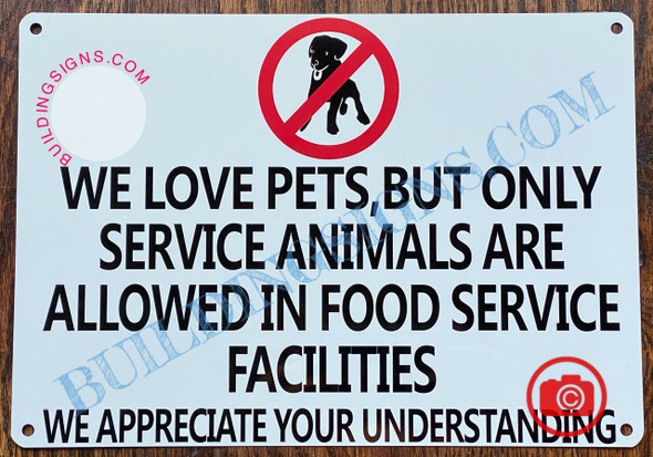 WE LOVE PETS BUT ONLY SERVICE ANIMALS ARE ALLOWED IN FOOD SERVICE FACILITIES SIGN- WHITE