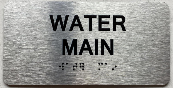 WATER MAIN SIGN WITH RAISED LETTERS