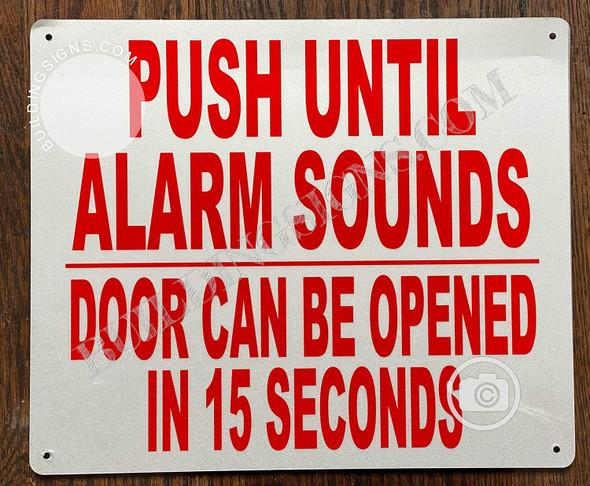 Push Until Alarm Sounds Door CAN BE Opened in 15 Seconds Sign