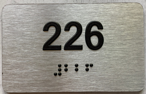 ADA APARTMENT NUMBER 226 SIGN