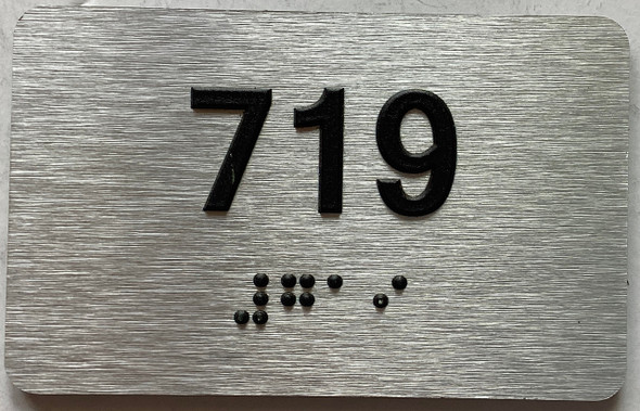 ADA APARTMENT NUMBER 719 SIGN