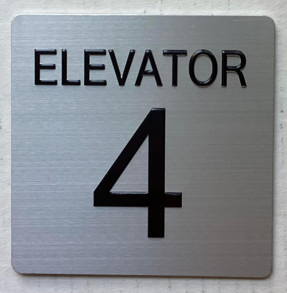 ELEVATOR NUMBER 4 SIGNAGE with Raised letters & Grade 2 Braille - Includes Red Adhesive pad for Easy Installation ELEVATOR NUMBER 4 SIGNAGE with Raised letters & Grade 2 Braille - Includes Red Adhesive pad for Easy Installation