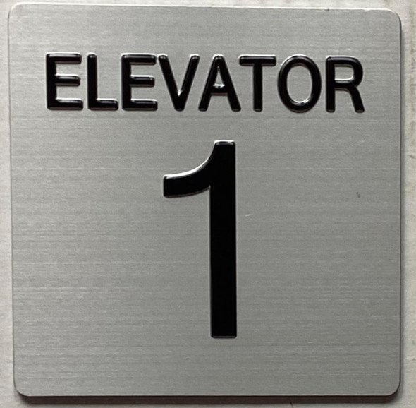 ELEVATOR NUMBER 1 SIGNAGE  with Raised letters & Grade 2 Braille - Includes Red Adhesive pad for Easy Installation ELEVATOR NUMBER 1 SIGNAGE  with Raised letters & Grade 2 Braille - Includes Red Adhesive pad for Easy Installation