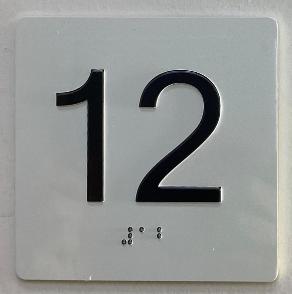 Elevator floor 12 Sign/jamb plate floor 12 SIGNAGE letters/Image & Grade 2 Braille - Includes Red Adhesive pad for Easy Installation Elevator floor 12 Sign/jamb plate floor 12 SIGNAGE letters/Image & Grade 2 Braille - Includes Red Adhesive pad for Easy Installation