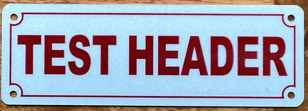 test-header-sign-2x6-inch-white-aluminum-mounting-holes.jpg