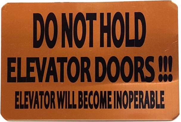 DO NOT HOLD ELEVATOR DOORS ELEVATOR WILL BECOME INOPERABLE DO NOT HOLD ELEVATOR DOORS ELEVATOR WILL BECOME INOPERABLE