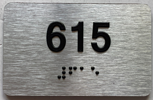 ADA APARTMENT NUMBER 615 SIGN