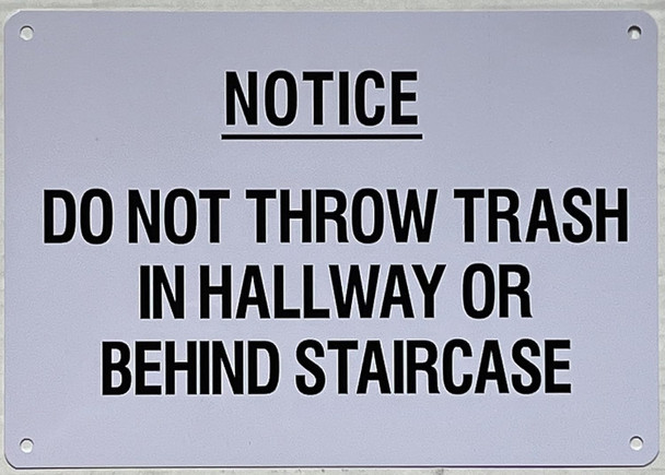 NOTICE: DO NOT THROW TRASH IN HALLWAY OR BEHIND STAIRCASE