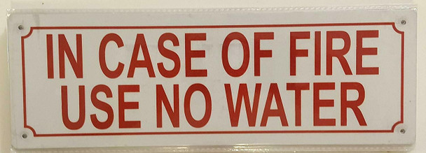 in CASE of FIRE USE NO Water Sign