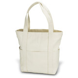 A beige canvas tote bag with two sturdy handles and an exterior pocket. It has a simple design and is unadorned.