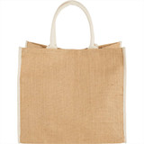 A large jute tote bag in natural brown with white handles, featuring a logo on one side.