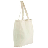 A natural cotton shopper tote in a cream colour, featuring two handles and a simple design.