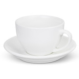 A white cup and saucer set with a simple design. The cup has a handle and rests on the matching saucer.