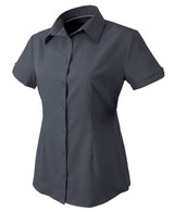 A dark grey button-up shirt for ladies with short sleeves and a chest pocket. It features a logo.