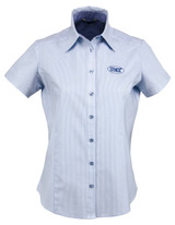 A light blue button-up ladies' shirt with short sleeves and a logo on the front.