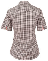 A short-sleeved women's button-up shirt in black and white gingham check with a red pattern on the sleeves. It features a logo.