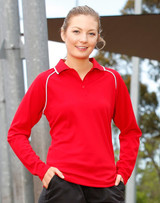 A red long-sleeved polo shirt with a contrasting trim and a logo. The model is smiling outdoors.