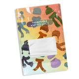 A large foil stand-up pouch featuring a colourful design of knitted hats and scarves. It has a transparent window and a logo.