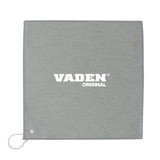 A grey golf towel with a loop for attachment, featuring a logo in the centre.