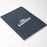 A navy blue A5 notebook with a textured cover, featuring a logo on the front.
